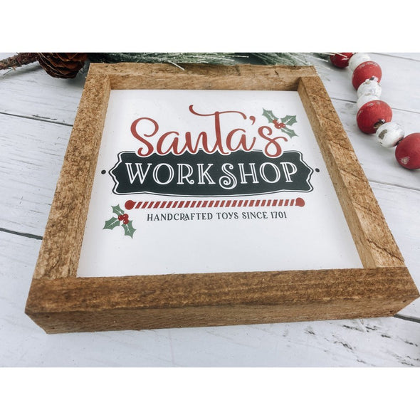 santa's workshop subway tile sign