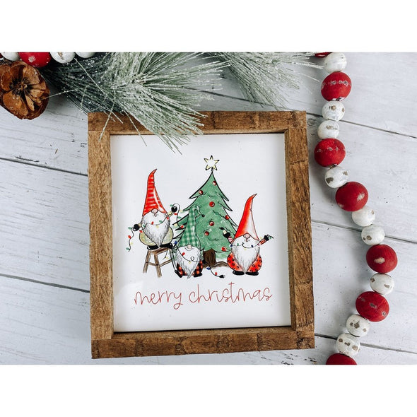 merry christmas with three gnomes and a tree sign