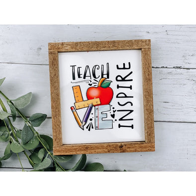 teach love inspire in color with apple sign